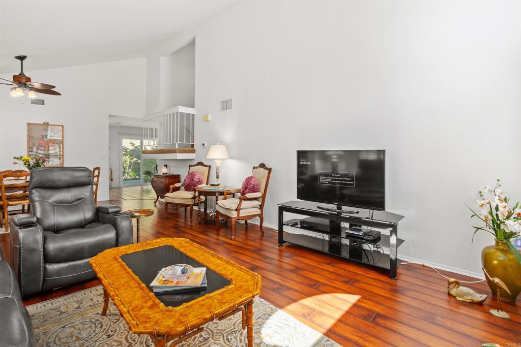 1991 Paseo Del Rey Vista, CA 92084 - Photo 7 of 42 a living room with furniture and a flat screen tv