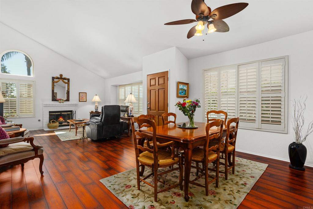 1991 Paseo Del Rey Vista, CA 92084 - Photo 9 of 42 a view of a dining room with furniture window and wooden floor