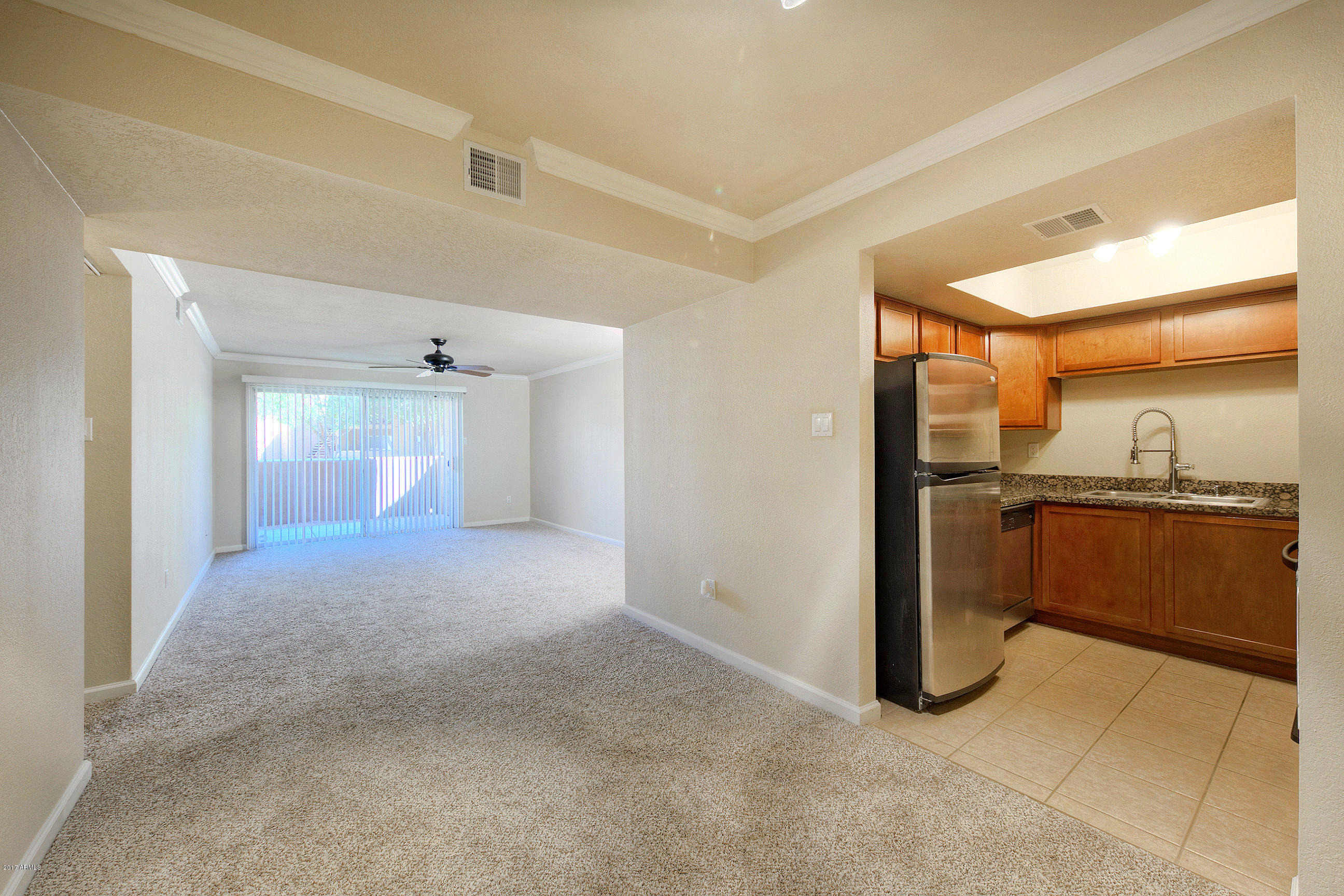 8256 East Arabian Trail, Unit 134 Scottsdale, AZ 85258 - Photo 11 of 24 a view of a bathroom with a sink and mirror