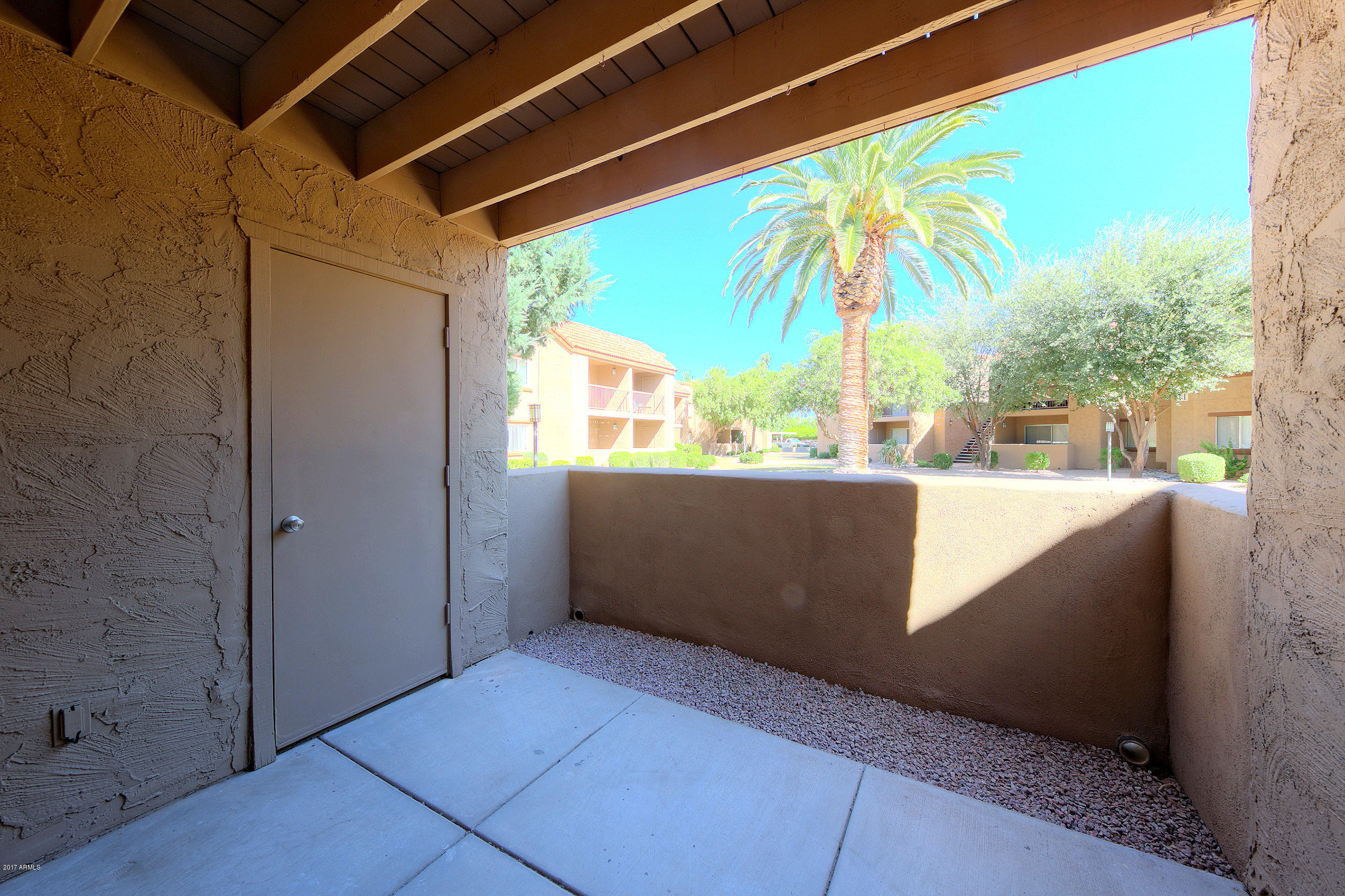8256 East Arabian Trail, Unit 134 Scottsdale, AZ 85258 - Photo 20 of 24 a view of a living room with a large window