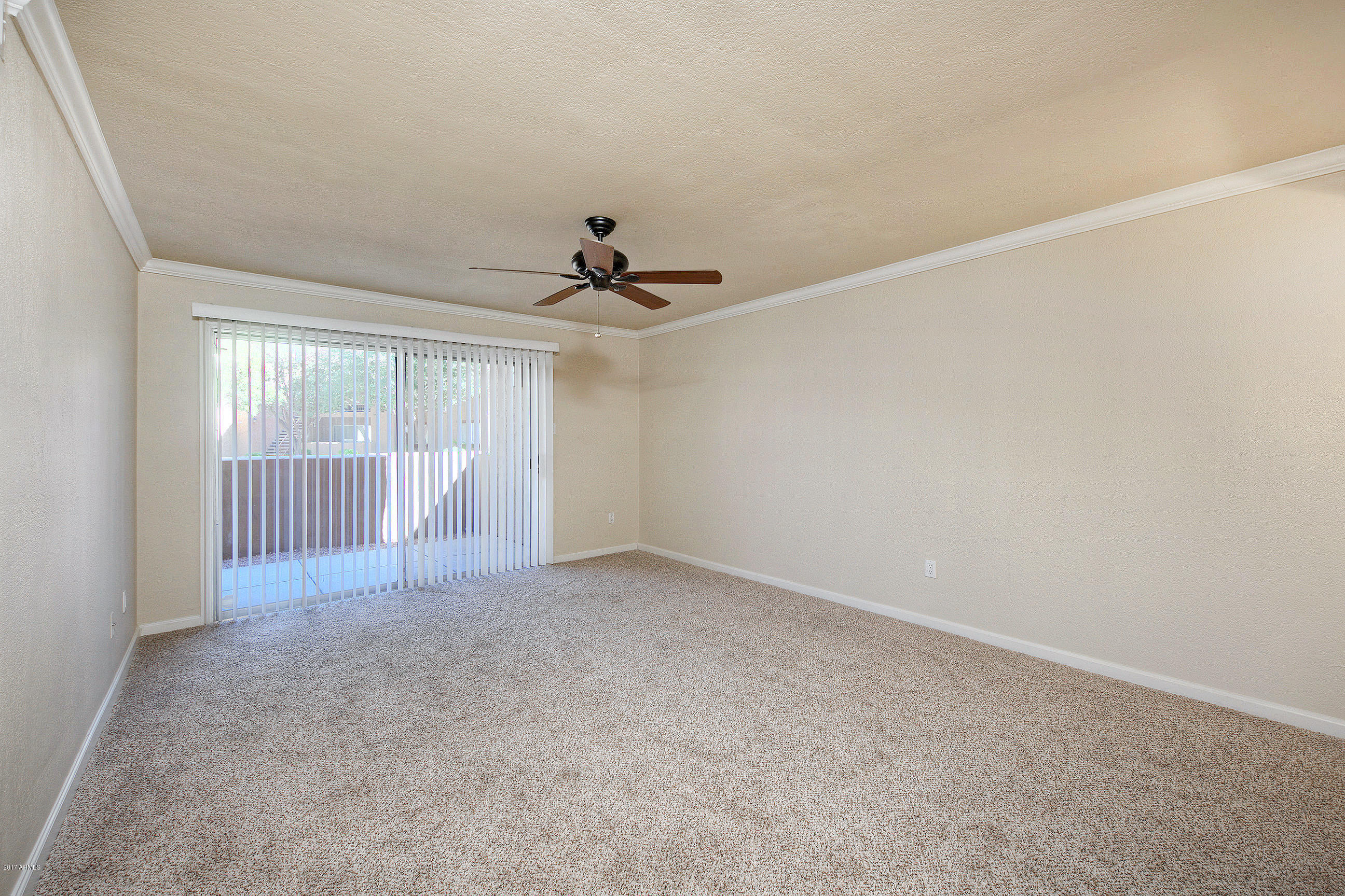 8256 East Arabian Trail, Unit 134 Scottsdale, AZ 85258 - Photo 5 of 24 a view of an empty room with a window