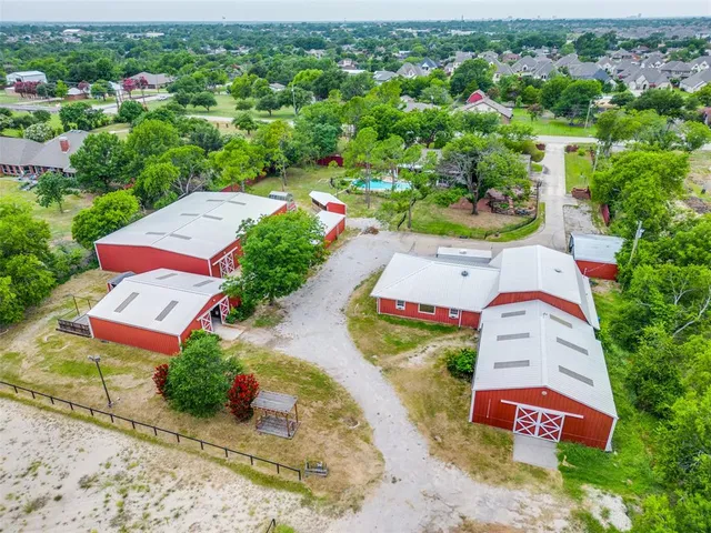 an aerial view of a house with a garden