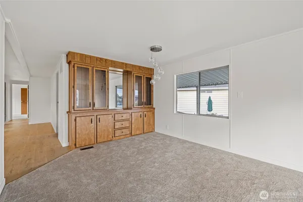 a big room with windows and closet