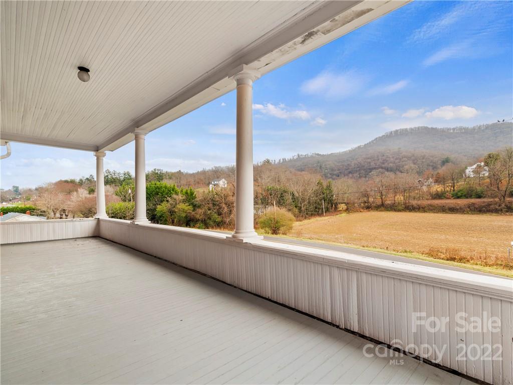 5593 Old Clyde Road Clyde, NC 28721 - Photo 27 of 35 a view of a building from a balcony