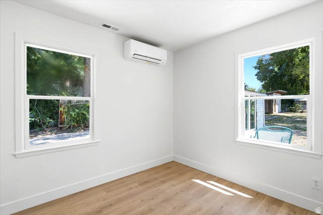 307 Flint Street Layton, UT 84041 - Photo 11 of 13 Bright interior space featuring light wood-finish flooring and white painted walls
