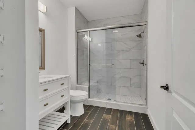a view of bathroom sink with toilet