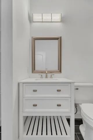 a balcony with wooden floor and fence