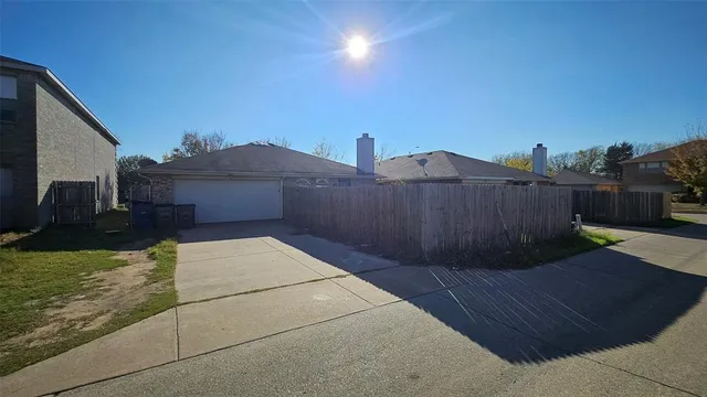 a view of a backyard of the house