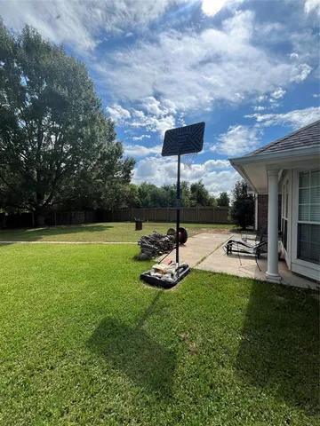 a view of a backyard with a garden