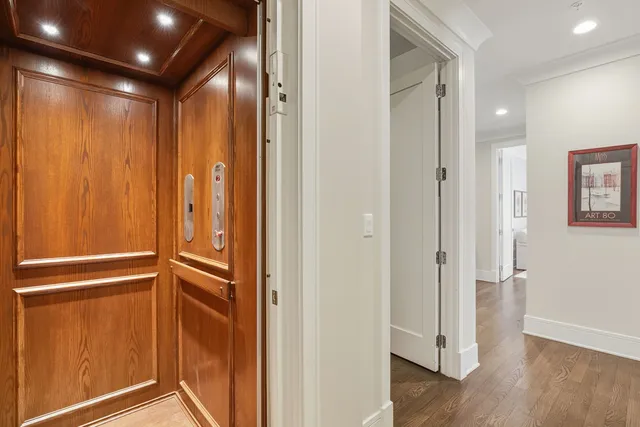 a bedroom with a bed and a table