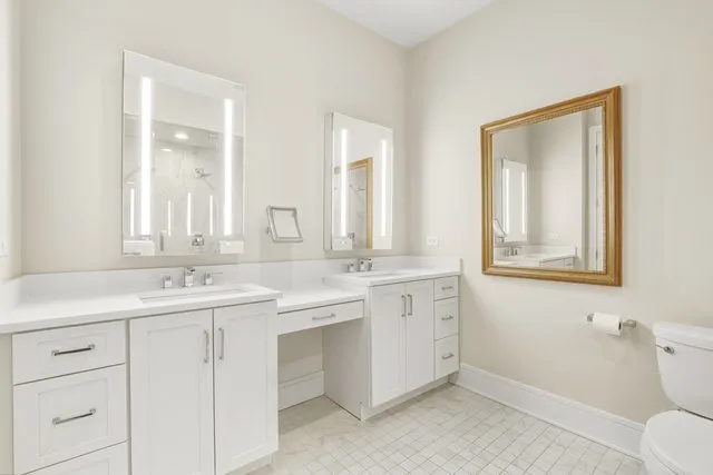 a bathroom with a shower and toilet