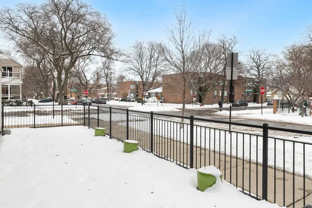 a front view of a building with many windows