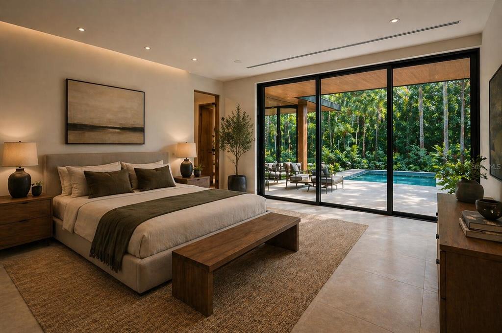 936 Paradise Boulevard Georgetown, FL 32139 - Photo 12 of 14 a spacious bedroom with a large bed and a large window