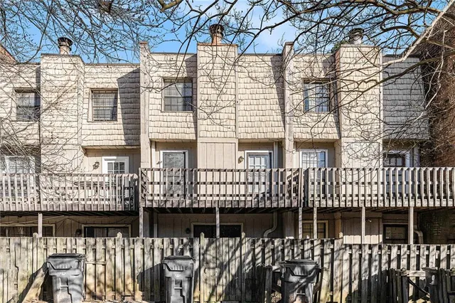 a view of a room with wooden walls