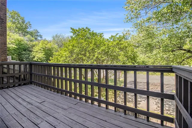 a view of a house with a small yard