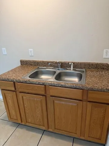 a utility room with washer and dryer