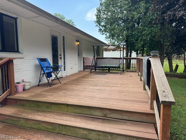 620 Ravenna Road Newton Falls, OH 44444 - Photo 17 of 23 Spacious outdoor deck with wood-finish decking and railing