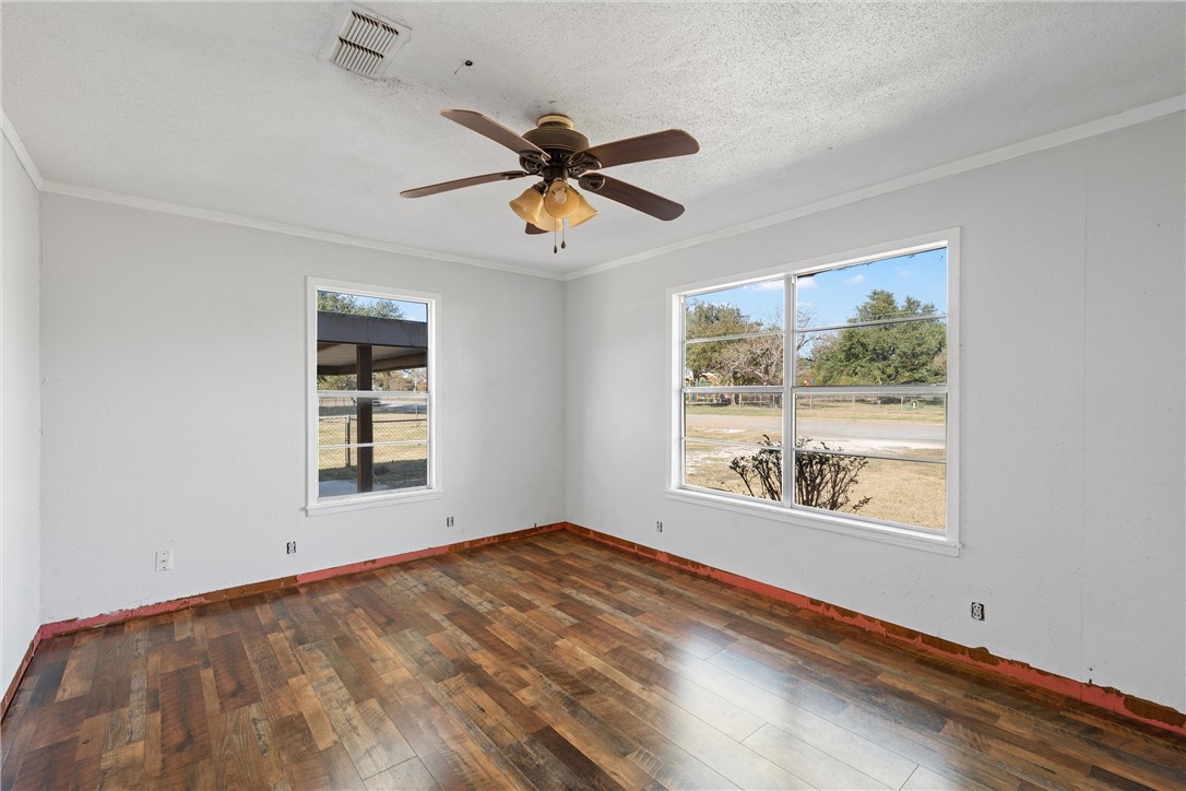 117 South Judge R W Hailey Drive Lott, TX 76656 - Photo 5 of 16 a view of an empty room with a window