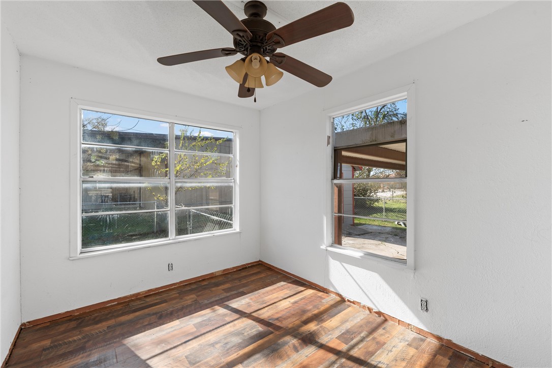 117 South Judge R W Hailey Drive Lott, TX 76656 - Photo 6 of 16 a view of an empty room with a window