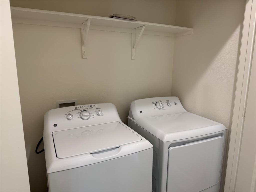 609 Merced River Lane Anna, TX 75409 - Photo 16 of 27 a utility room with dryer and washer