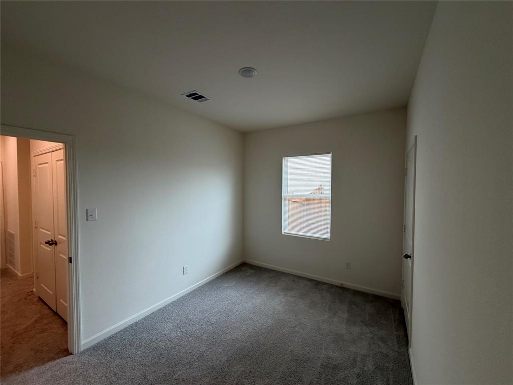 609 Merced River Lane Anna, TX 75409 - Photo 20 of 27 an empty room with a window