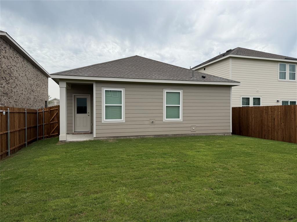 609 Merced River Lane Anna, TX 75409 - Photo 25 of 27 a backyard of a house
