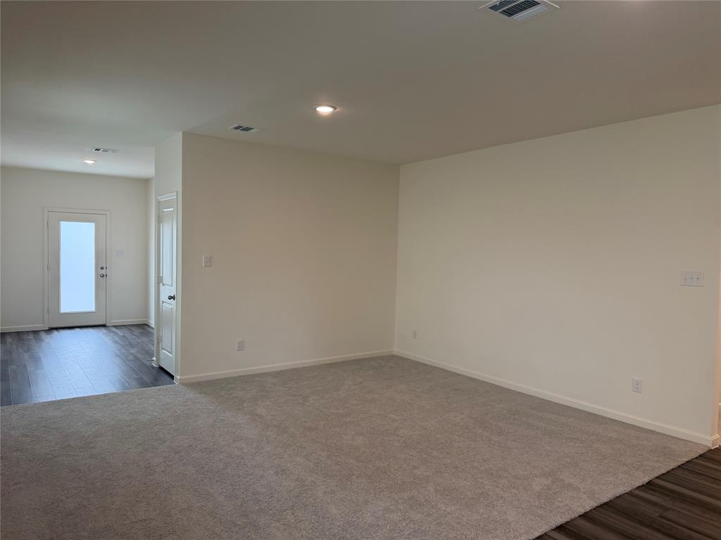 609 Merced River Lane Anna, TX 75409 - Photo 4 of 27 a view of a room with wooden floor