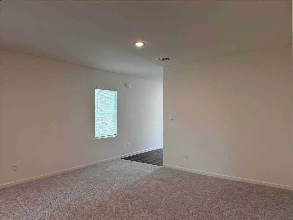 609 Merced River Lane Anna, TX 75409 - Photo 5 of 27 an empty room with window