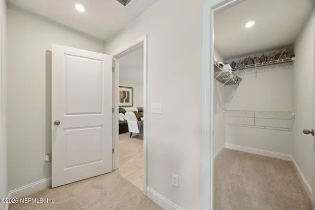 a view of a walk in closet