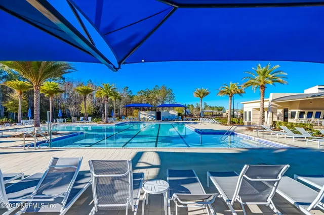 a view of yard with outdoor seating