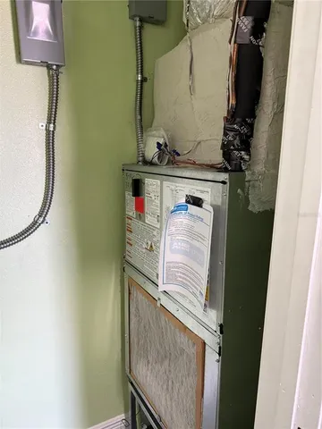 a view of a room with a large window