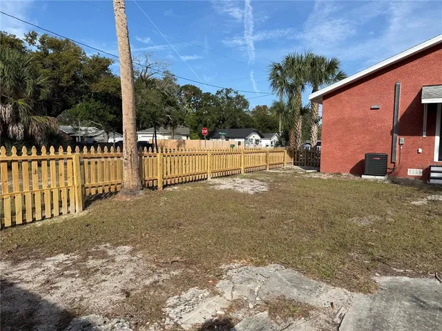 a view of swimming pool with trees
