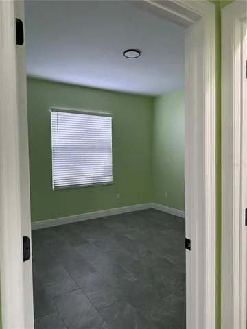 a view of an empty room with window