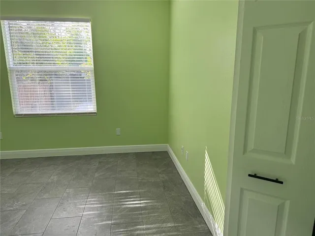 a view of a small space with a window