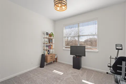 a bathroom with a sink toilet vanity and bathtub
