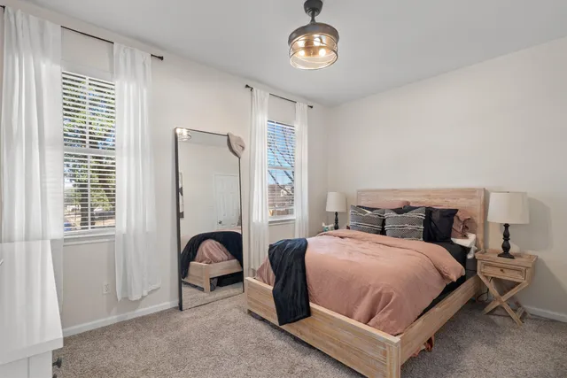 a front view of a house with a large window