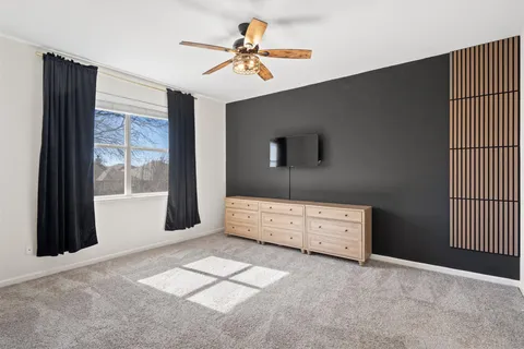 a view of workspace with furniture and window