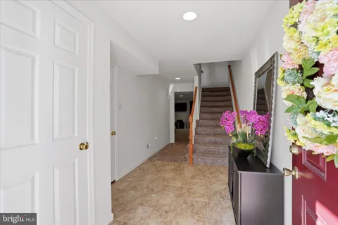 a hallway with flowers and flowers