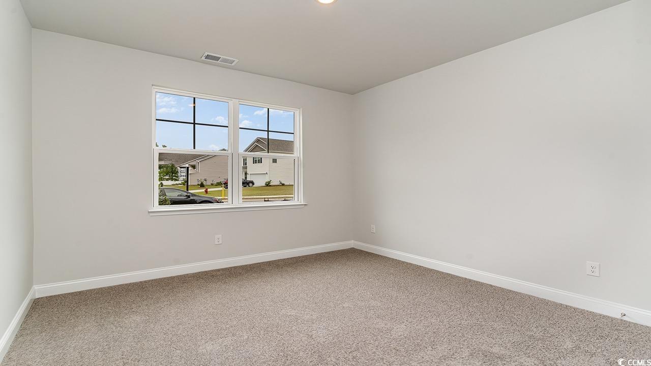 108 Fair Meadow Loris, SC 29569 - Photo 4 of 24 View of carpeted empty room
