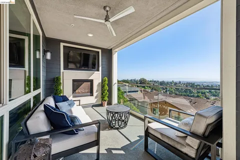 a view of a terrace with furniture
