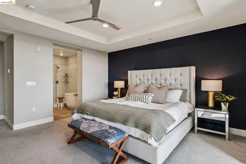 a view of sitting area in balcony with furniture