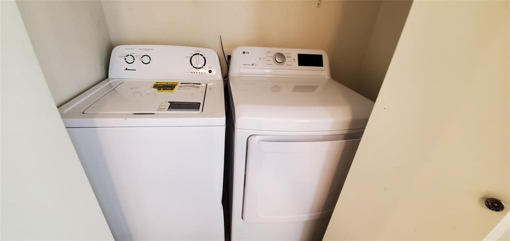 3012 North Bell Avenue Denton, TX 76209 - Photo 13 of 15 a utility room with dryer and washer