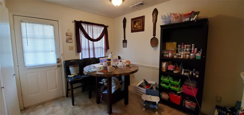 3012 North Bell Avenue Denton, TX 76209 - Photo 10 of 15 a view of a room with furniture and entryway