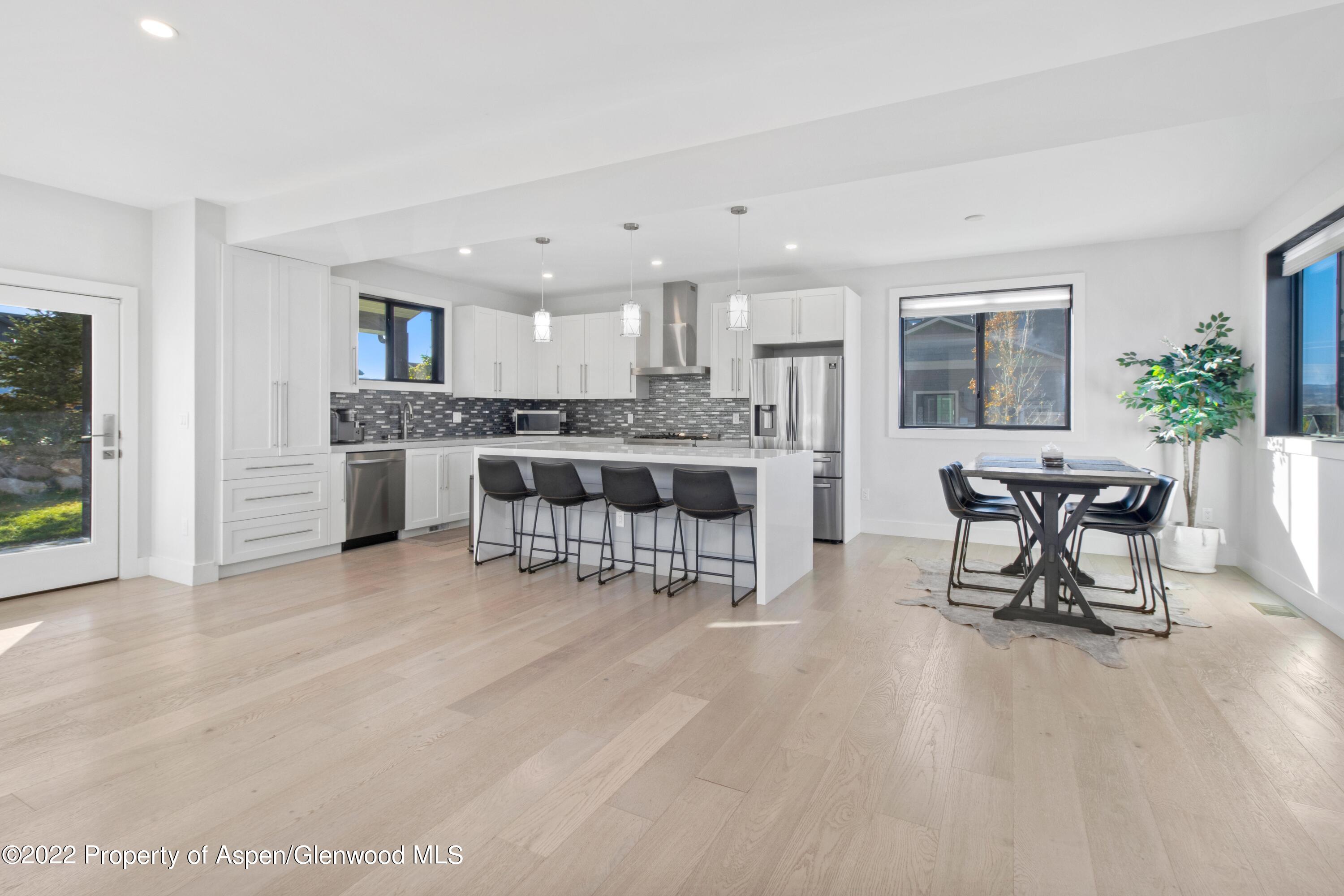 715 Eagles Nest Drive Silt, CO 81652 - Photo 5 of 19 a view of a dining room with furniture window and outside view