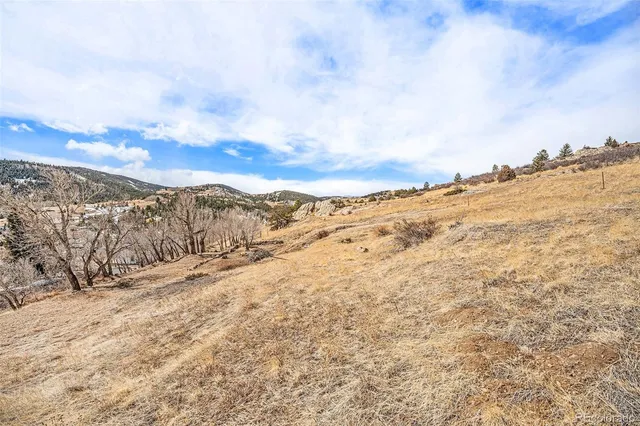 a view of mountain view with covered with snow
