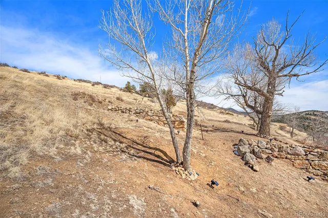 a view of snow on the side of a road
