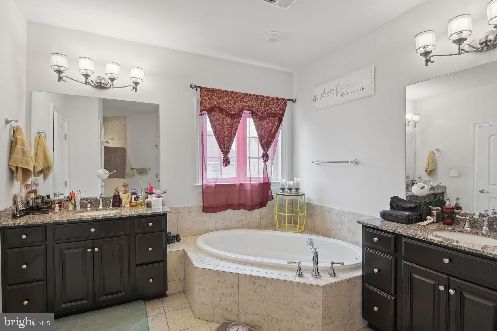 14607 Parkgate Drive Laurel, MD 20707 - Photo 18 of 25 Owner's Bathroom within the room.