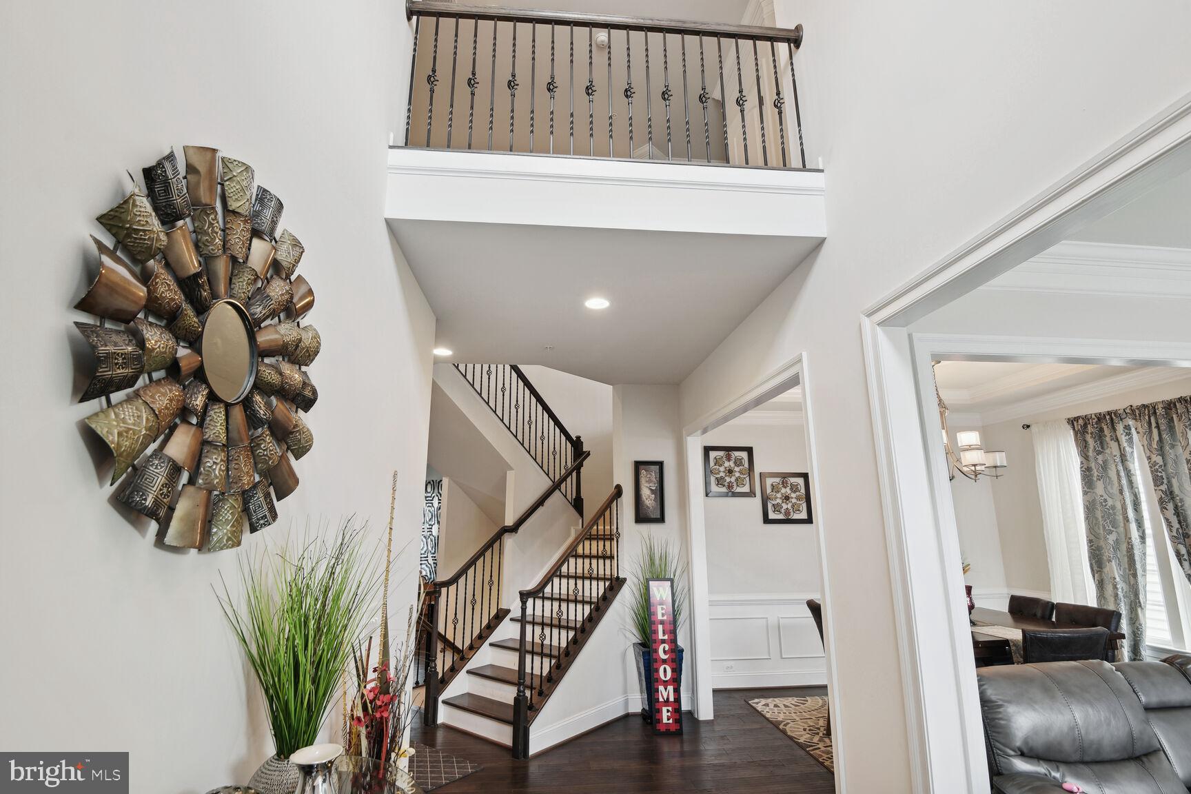 14607 Parkgate Drive Laurel, MD 20707 - Photo 3 of 25 Hardwood floor Showing Stairs to Upper Level.