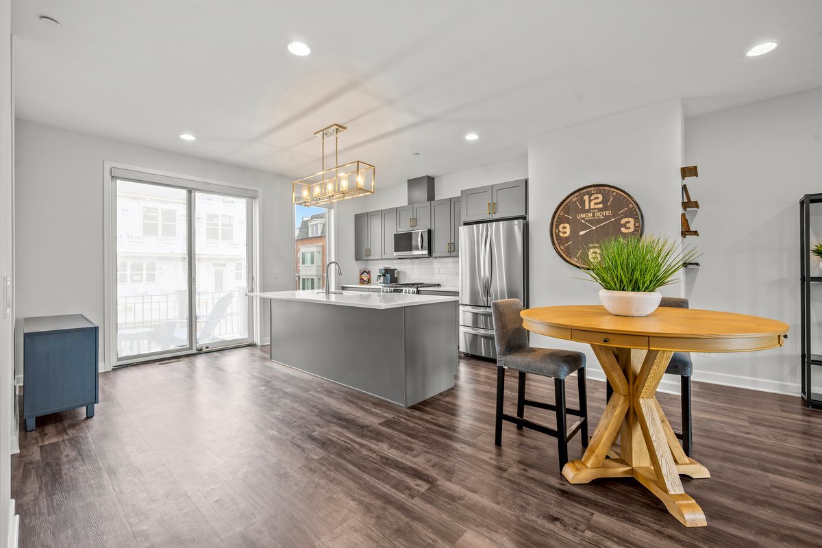 1229 Shermer Road Northbrook, IL 60062 - Photo 6 of 21 a view of a dining room with furniture window and wooden floor