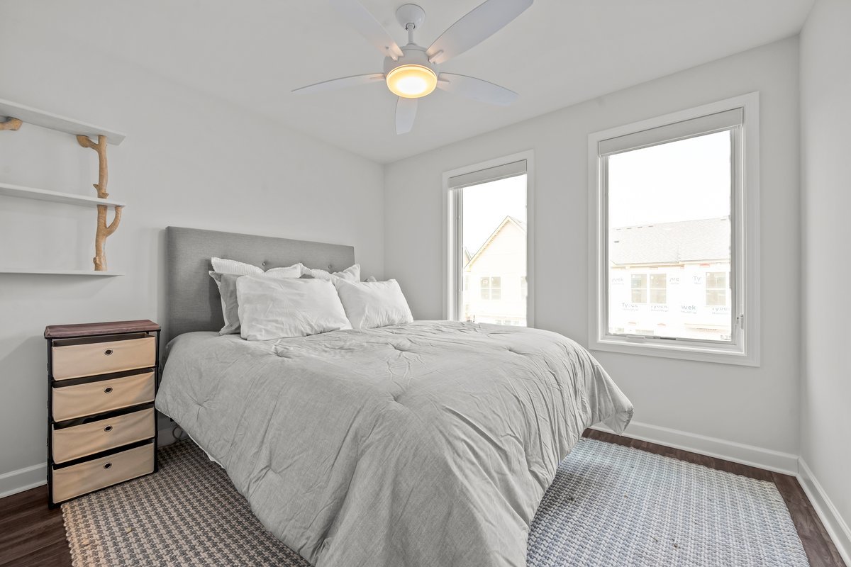 1229 Shermer Road Northbrook, IL 60062 - Photo 9 of 21 a bedroom with a bed and a window